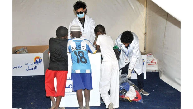 Volunteers mount campaign to clean clothes for flood victims