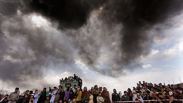 Pakistani police: Gunmen torch 2 NATO oil tankers