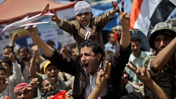Yemen protesters remember dead, talks stall