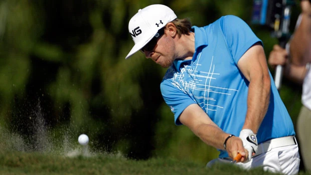 Mahan loses his cushion but keeps lead at Doral