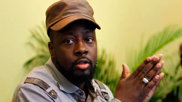 Wyclef Jean shot in hand in Haiti