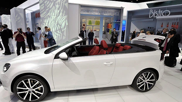Carmakers focus on green power as fuel costs rise