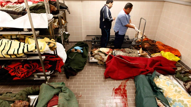 Allied planes fly over Libya as Qaddafi's forces attack Benghazi