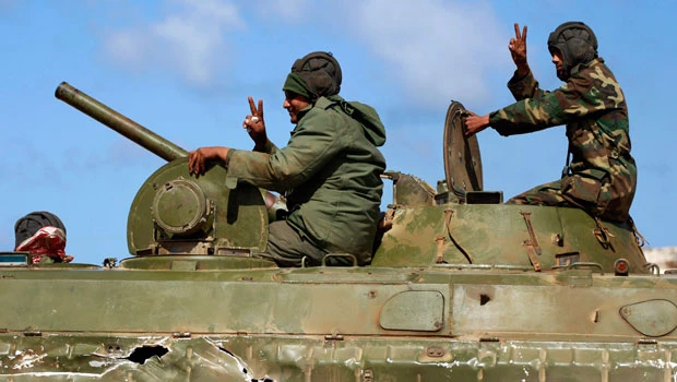 Libya rebels reject talks on Qaddafi exit