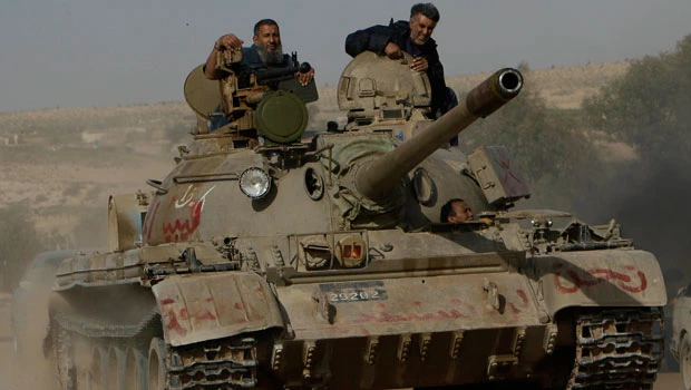 Libyan rebels rout Qaddafi's forces in Brega
