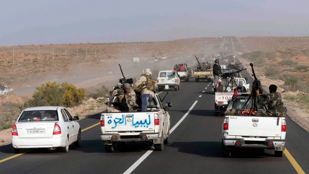 Libyan rebels bear down on Qaddafi’s hometown