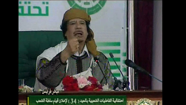 Qaddafi warns of conspirary to colonize Libya again; blames Al-Qaeda, West