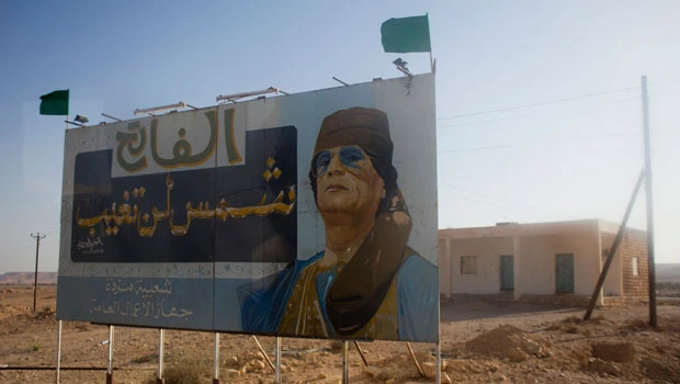 UK talks agree Qaddafi must go