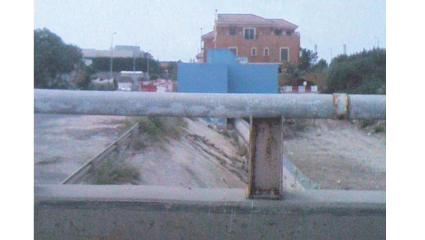 Officials have no explanation for houses built along rainwater canal