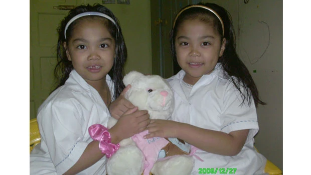OFW group pledges help to Filipino twins