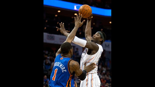 Hawks top Nets to nail playoff spot