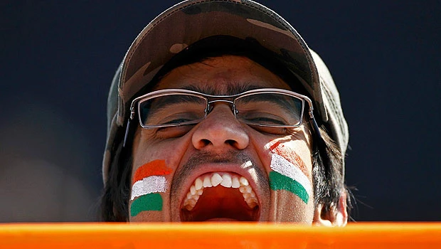India down Dutch to put one foot into quarters