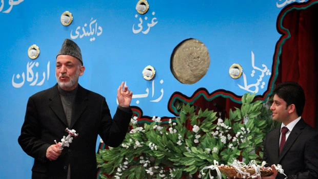 Karzai urges Taleban not to burn schools