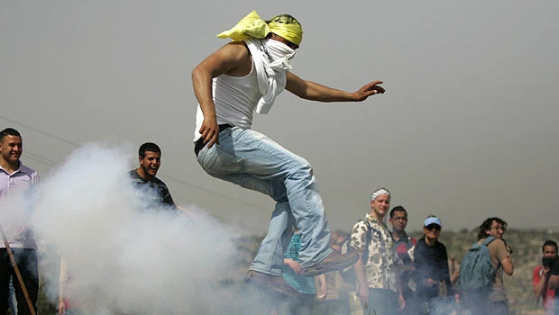 Israeli forces, occupiers attack Palestinians in West Bank