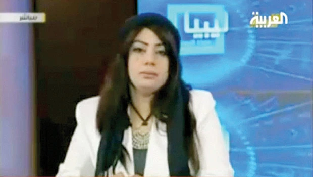 Ferociously pro-Qaddafi, Libyan anchor leaps to fame