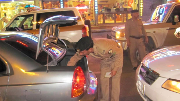 Police raids land scores in prison