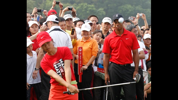 Tiger says swing change starting to pay off