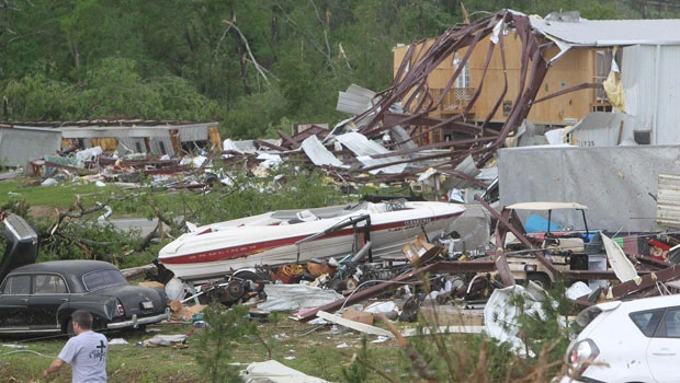 At least 11 dead as storms pound US South