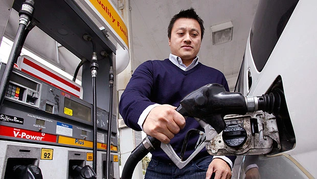 Oil lifted by weak dollar, to post eight-monthly gain