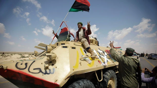 Libyan rebels reorganize ranks amid setbacks