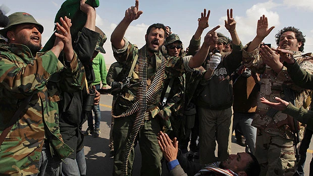 Qaddafi aide seeks talks with West to halt airstrikes