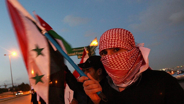 Syrian forces fire at mourners, UN "greatly disturbed"