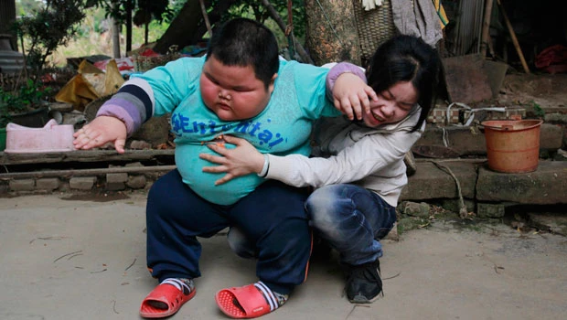 Chinese toddler fights fat in land of little emperors