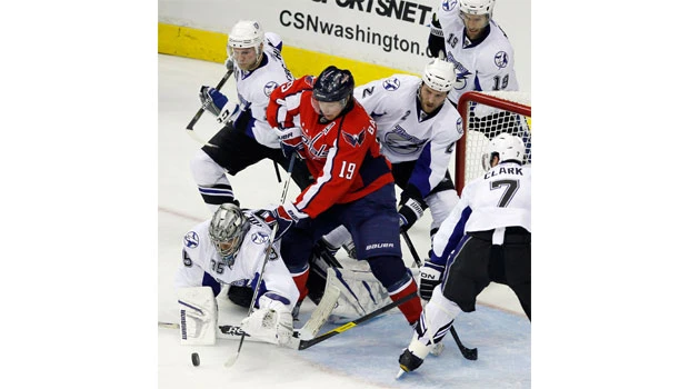 Lightning strike down Caps; Sharks win opener