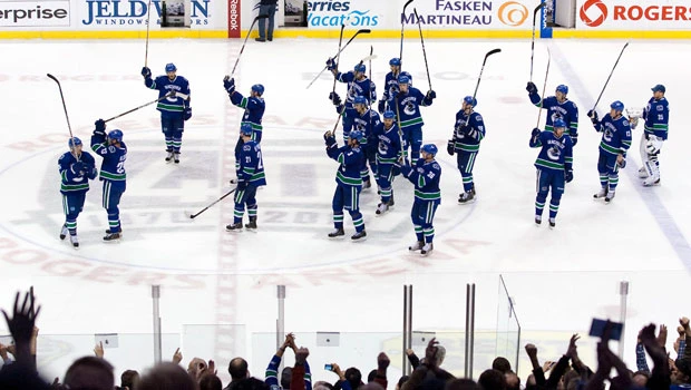 Canucks down Kings for NHL’s best record