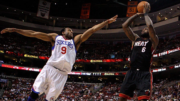 Boston roll on, Sixers cool off Heat