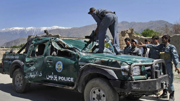2 Afghan police die, NATO chopper crashes in east