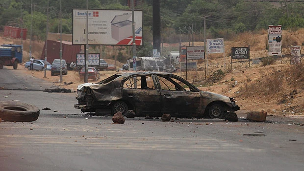 Charred corpses line road after Nigeria vote riots