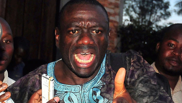 Ugandan forces fire tear gas, hold opposition leader