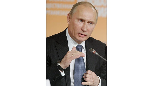 Putin says Russia to lift grain export ban from July 1