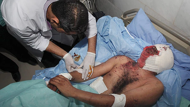 Suicide bomber rams Iraq police station, kills 20