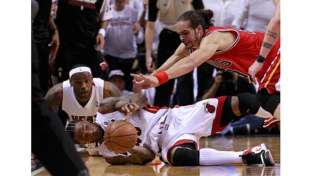 Miami shines in OT to put Bulls on the brink