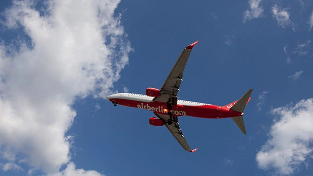 Corporate travel firm shrugs off unrest, ash cloud impact