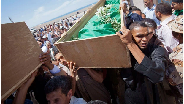 Libyans bury 'preachers' slain in NATO strike