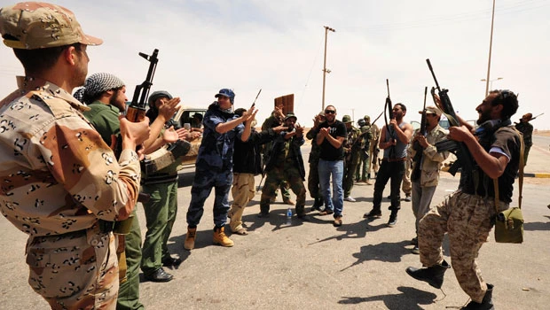 NATO planes pound Libyan government weapons depot