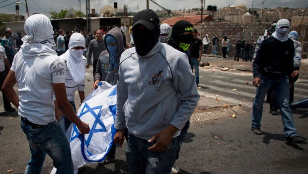Clashes mar teenager’s funeral in Jerusalem