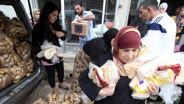 Rights group raises Friday toll in Syria to 44