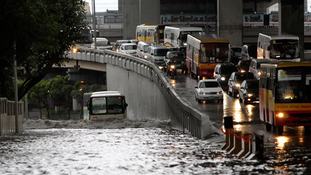 Philippine storm kills 9 people, thousands flee homes