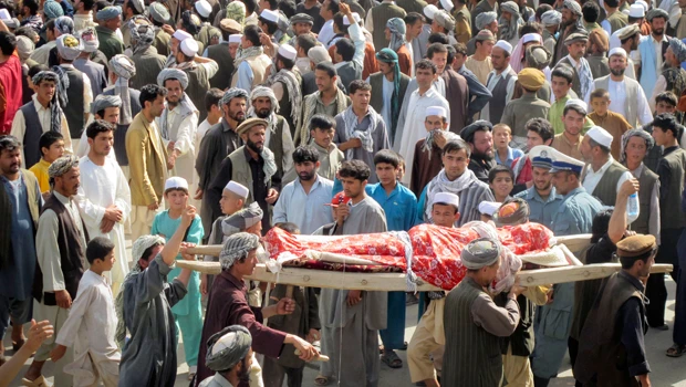 Afghan rally over NATO raid turns violent; 11 die