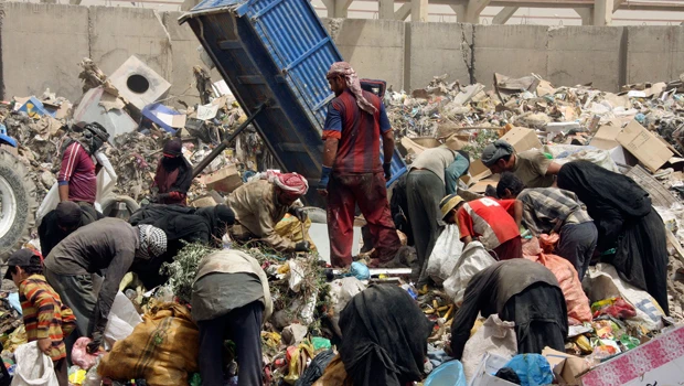 For Baghdad’s poor, city garbage brings in the bread