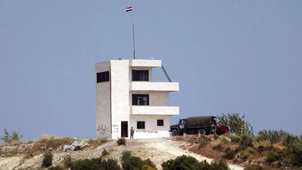 Syria forces spread through border area; 19 killed