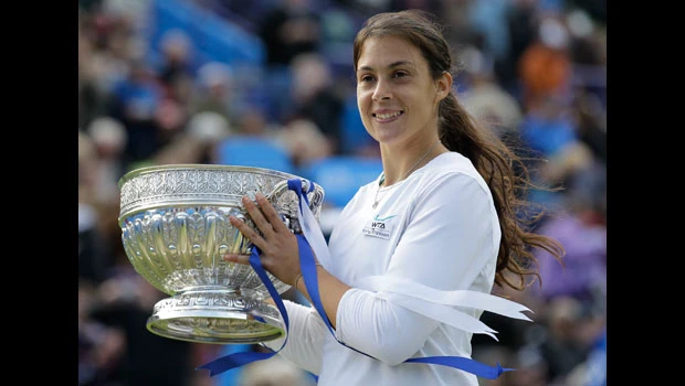 Bartoli battles hard to win Eastbourne title