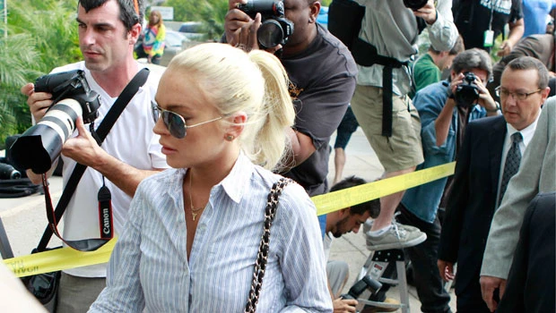 Lohan fails alcohol test, given warning