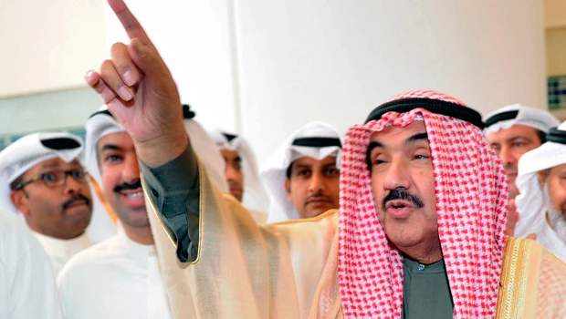 Kuwait’s premier survives key vote in parliament