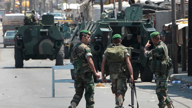 Lebanon sends troops after residents clash on Syria