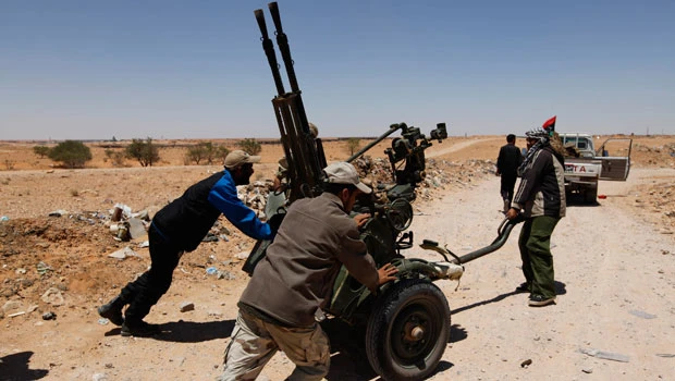 NATO warships fire on Qaddafi forces — Libyan rebels